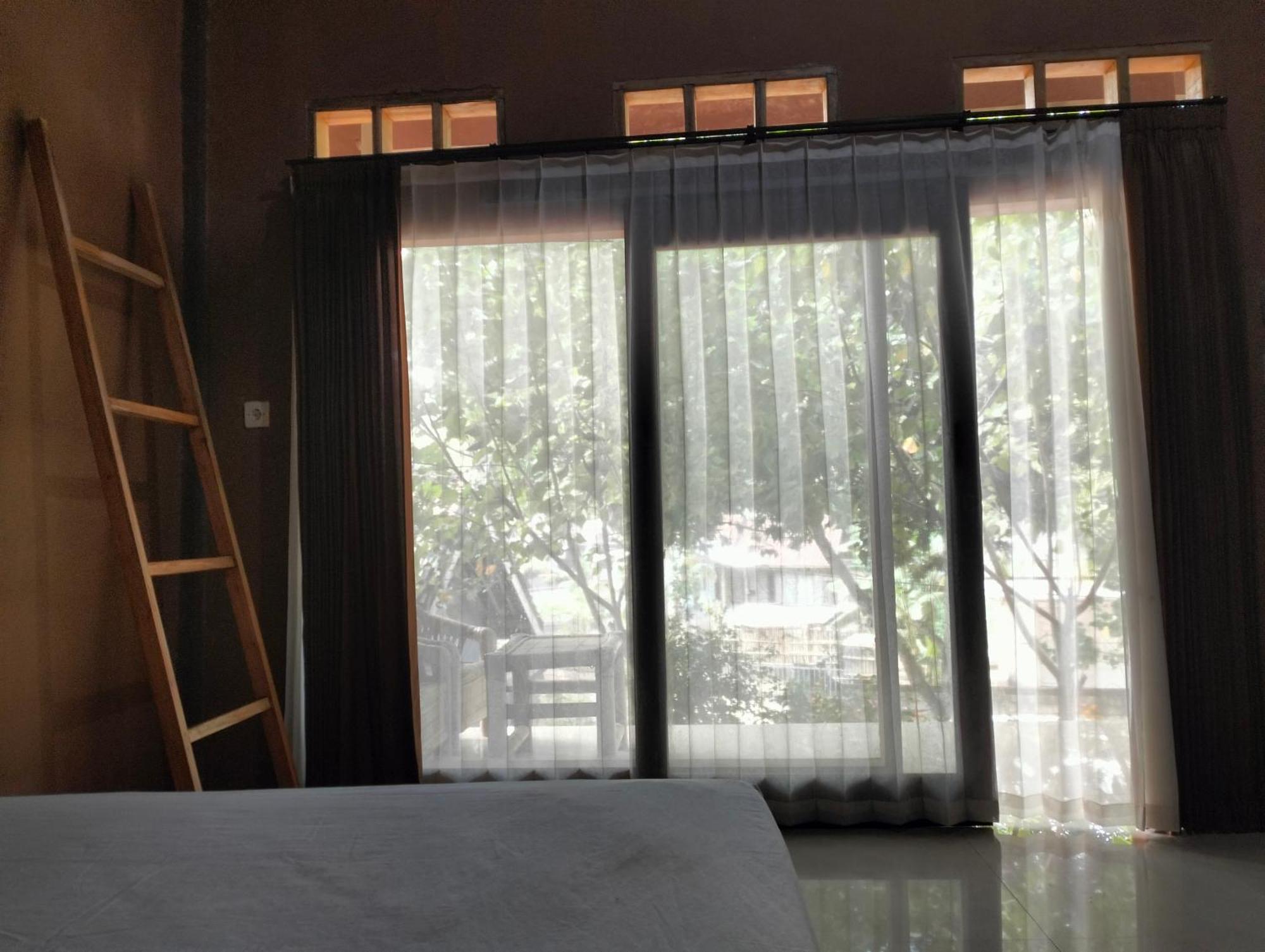 Fullmoon Homestay Kuta  外观 照片